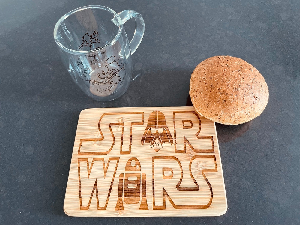 Small bamboo breakfast board with the iconical Star Wars logo