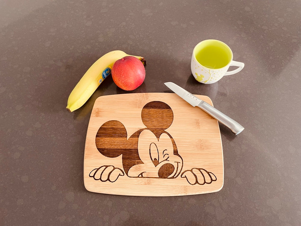 Medium bamboo breakfast board with a winking Mickey