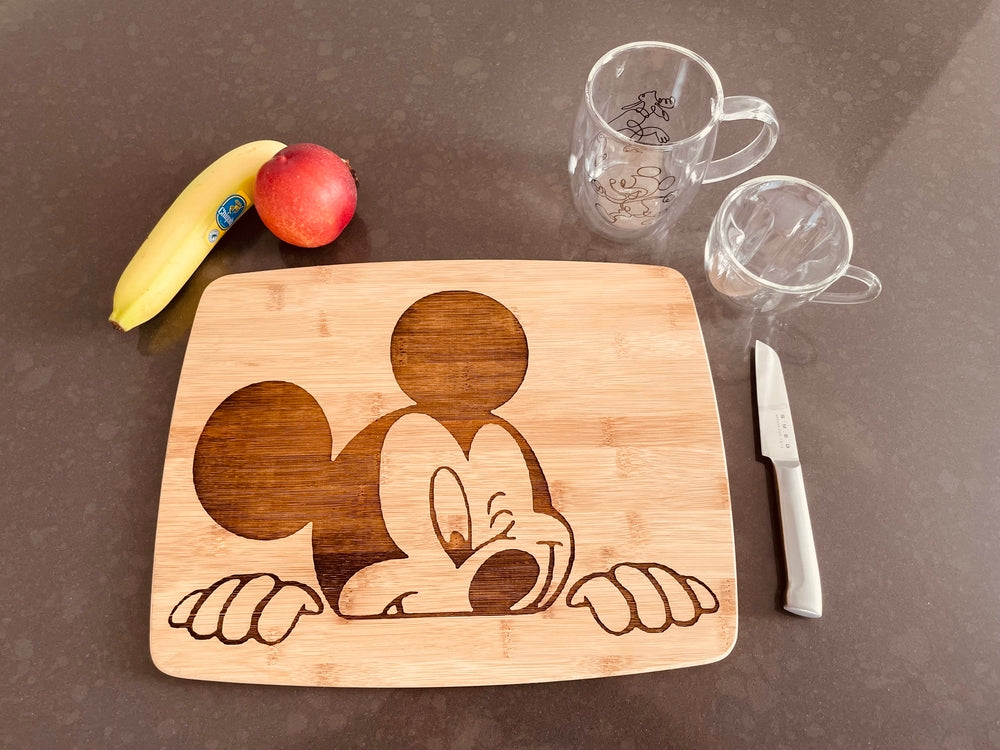 Large bamboo breakfast board with a winking Mickey