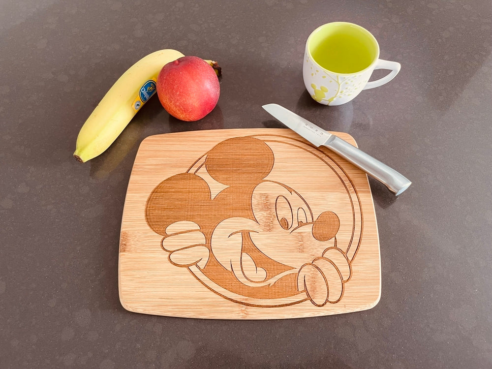 Medium bamboo breakfast board with a peeking Mickey