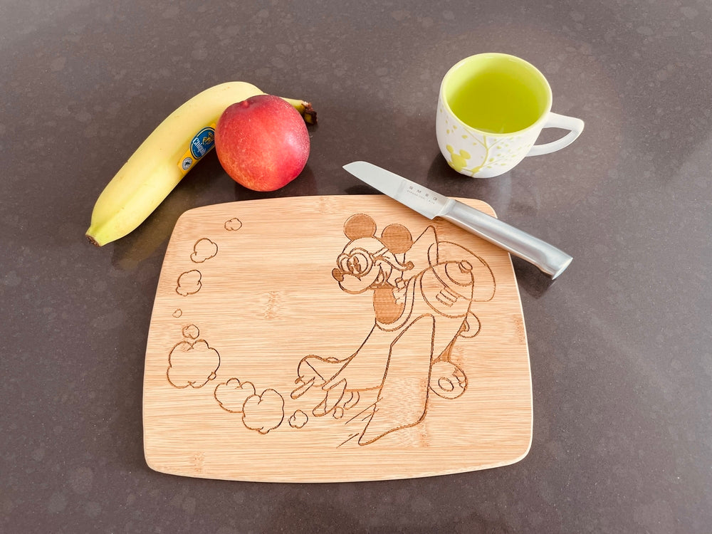 Medium bamboo breakfast board with Mickey in an airplane