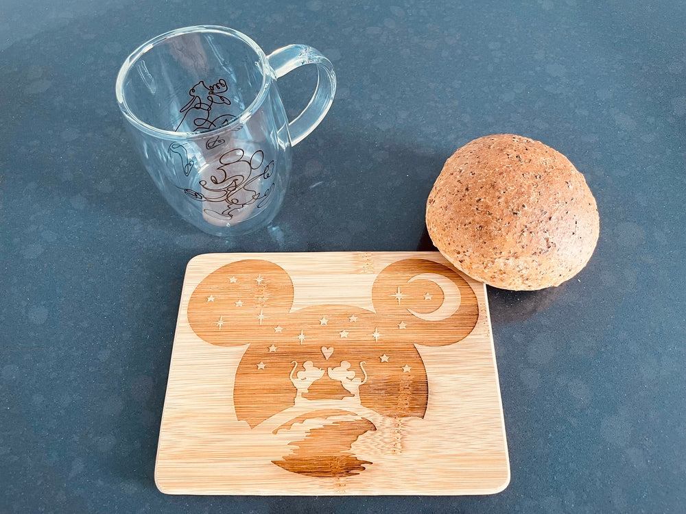 Small bamboo breakfast board with a starry kiss of Mickey & Minnie