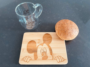 Small bamboo breakfast board with a peeking Mickey